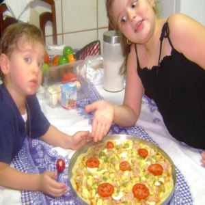 Pizza à moda da casa da Eloah e do Augusto