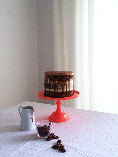 a birthday cake for prince charming. { semi-naked hummingbird cake with mascarpone frosting and toffee caramel sauce }