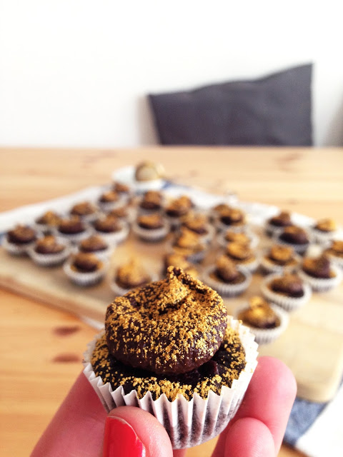 bite sized frosted babies with golden sparkles. { gluten-free vegan devil's food mini cupcakes }
